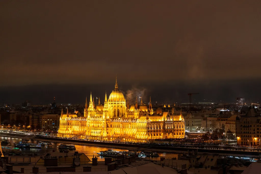 The Hungarian Parliament lit up across the Danube on a winter night