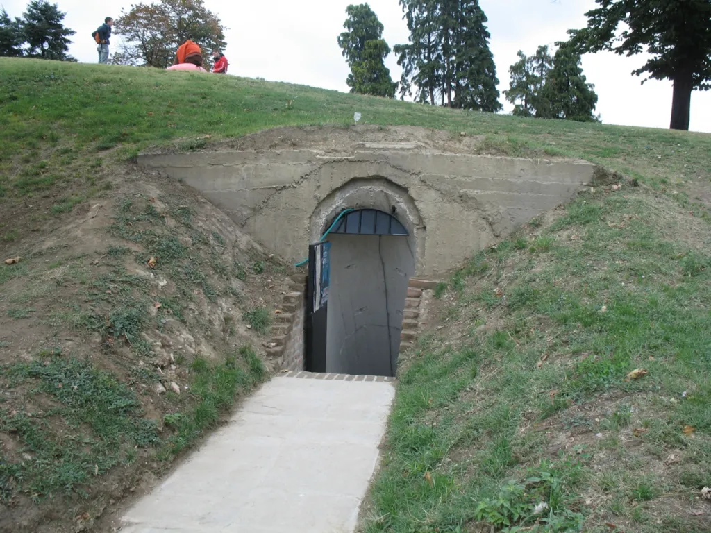The grassed-over entrance to a former anti-aircraft bunker in Belgrade Fortress