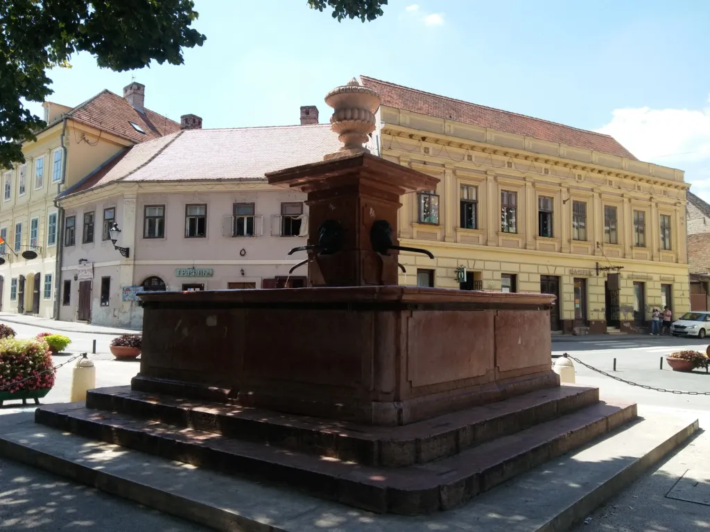 The red marble Four Lions Fountain on the main square of Sremski Karlovci