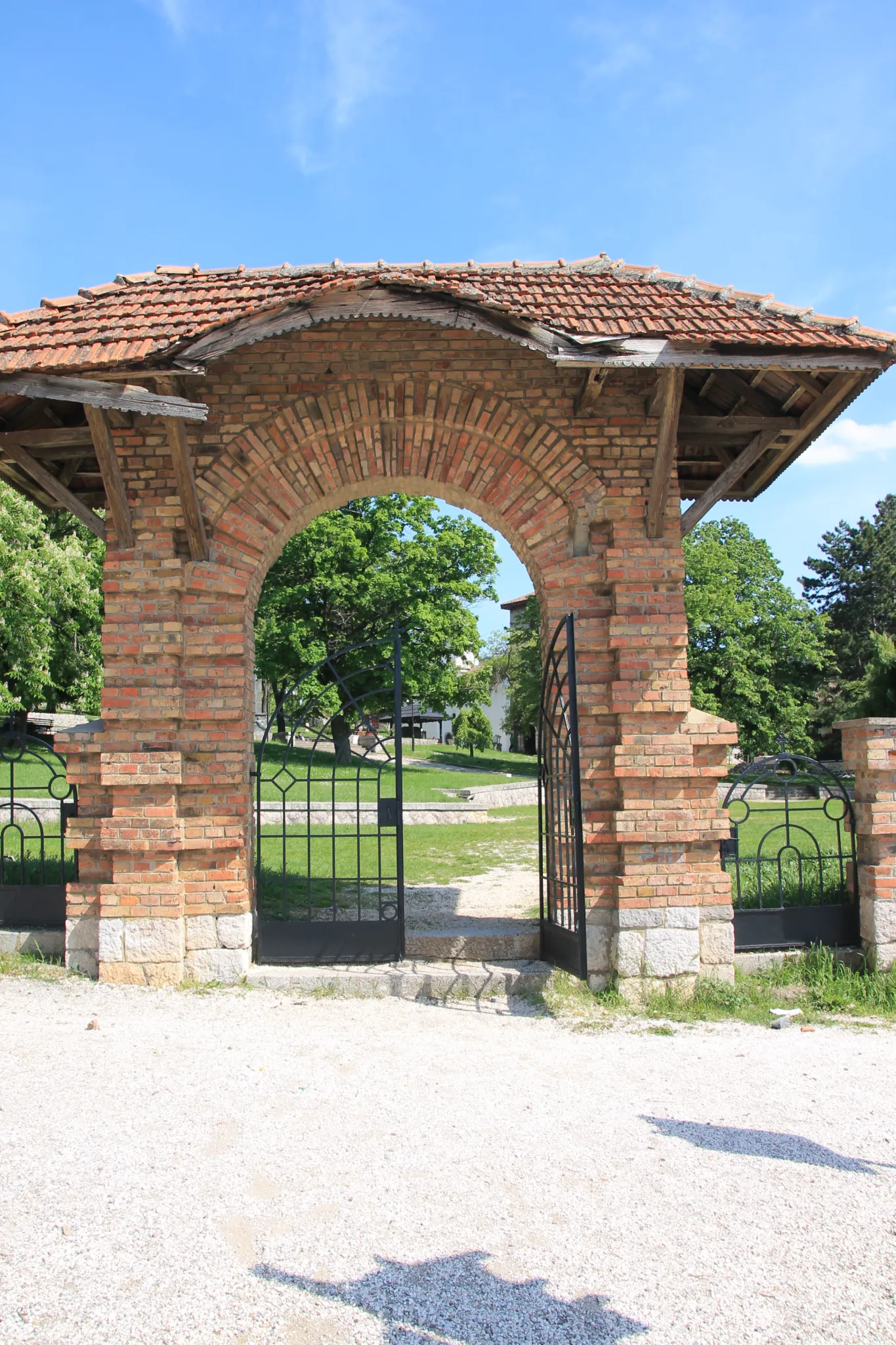 The brick arched gate leading into Karađorđe’s Town in Topola