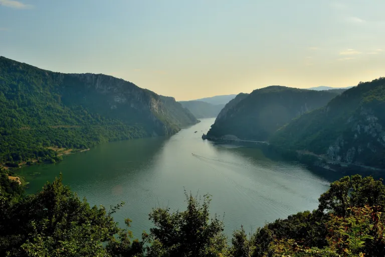 The Danube winding through the Iron Gates gorge in afternoon light