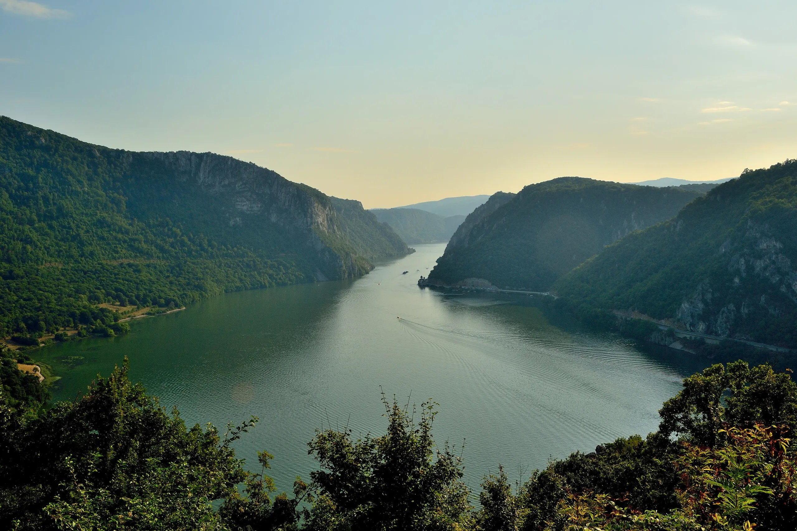 The Danube winding through the Iron Gates gorge in afternoon light
