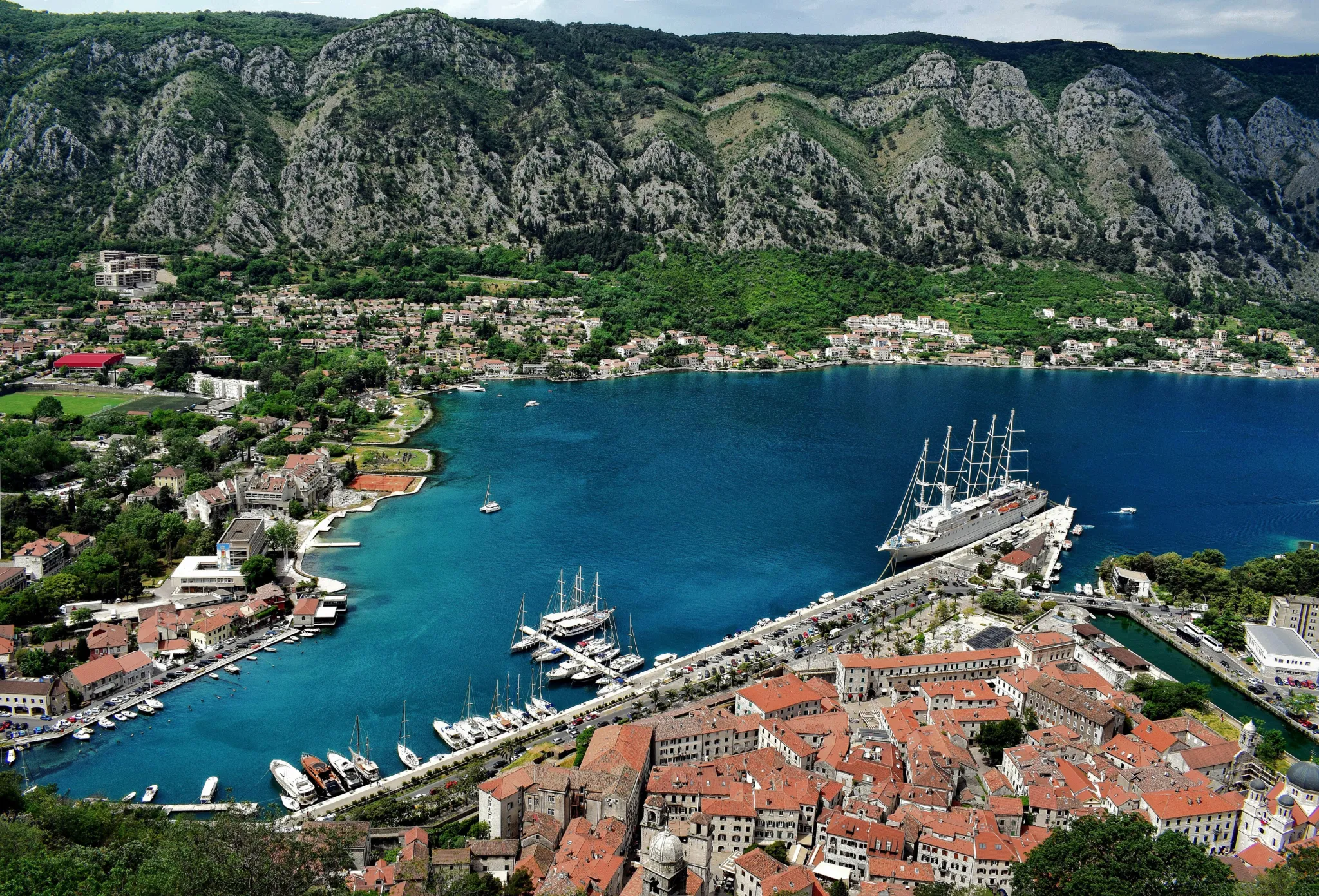 The walled old town of Kotor and its harbour seen from the slopes above, Montenegro