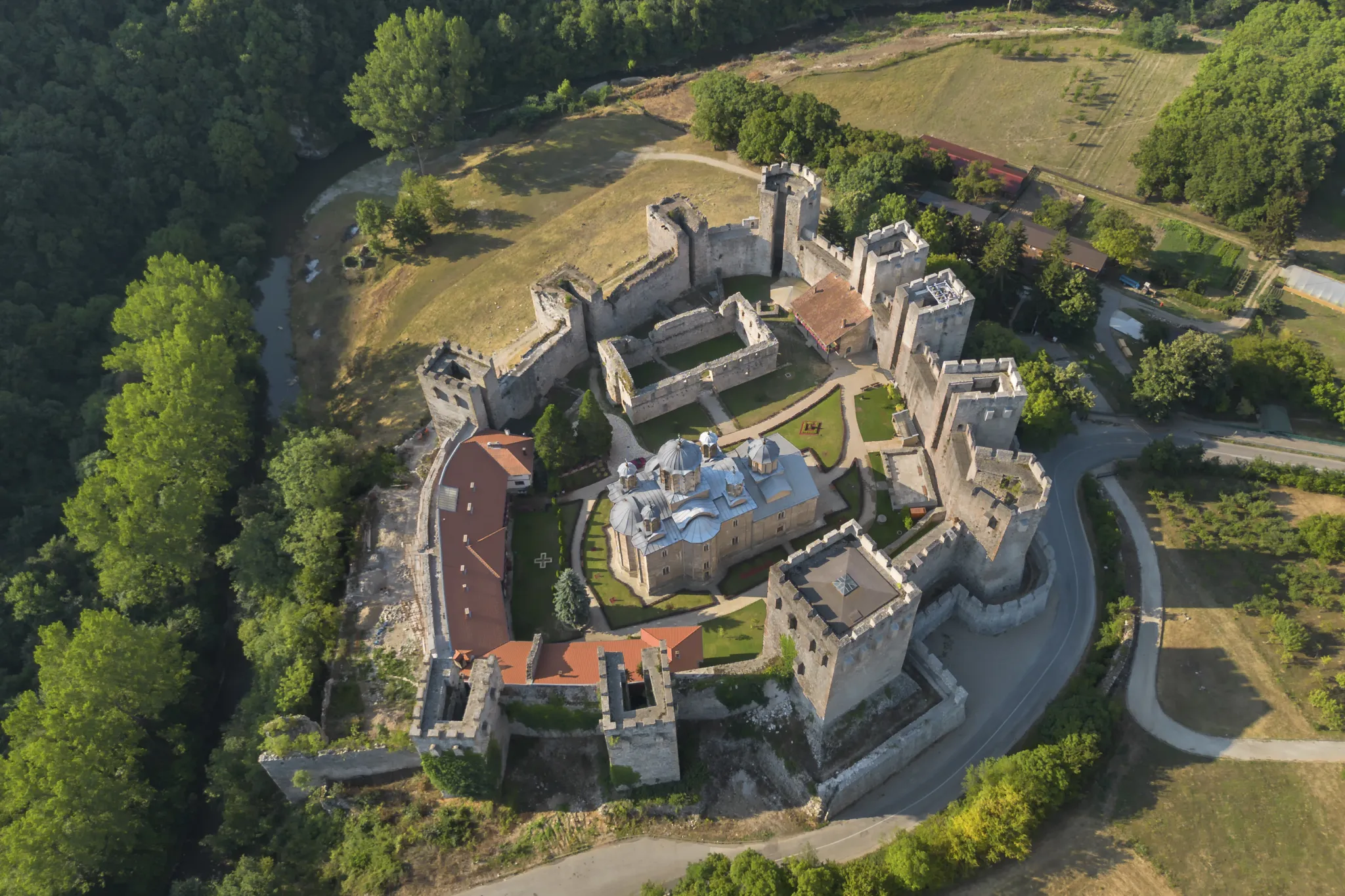 Aerial view of Manasija Monastery’s towered fortress walls in the Resava valley
