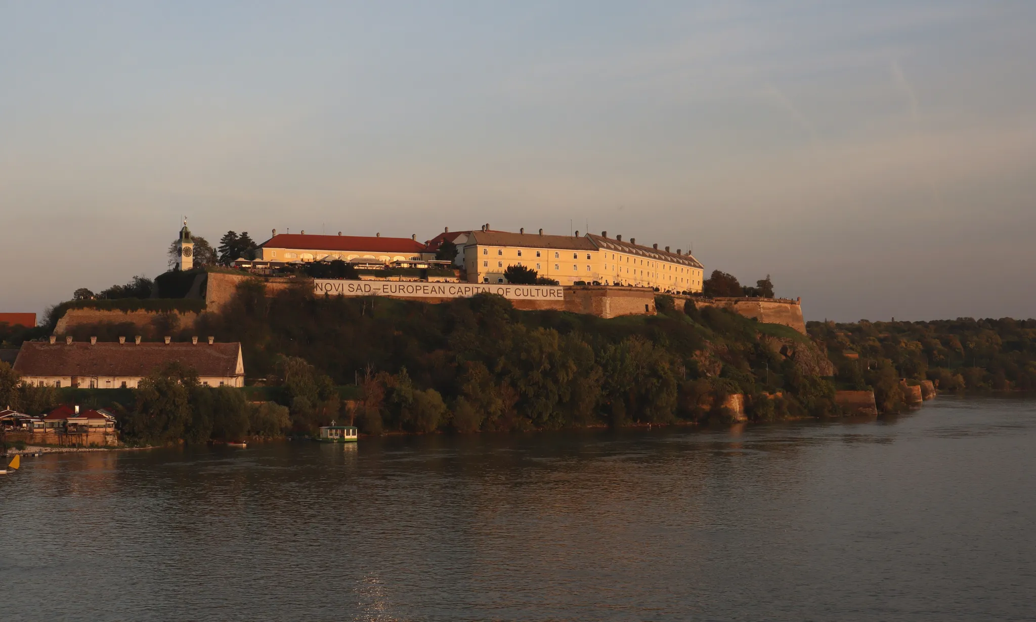Petrovaradin Fortress and the Danube glowing in the evening light, Novi Sad
