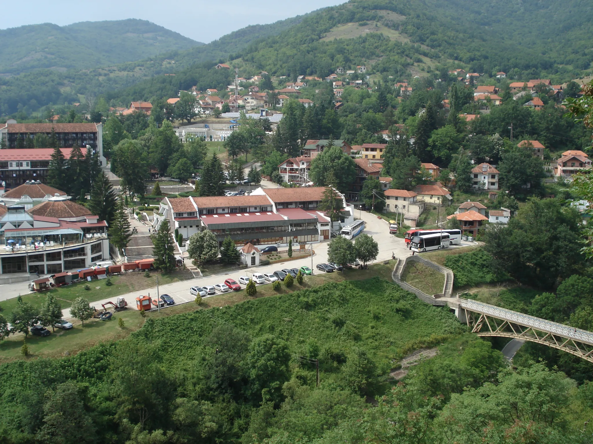 The spa village of Prolom Banja among wooded hills