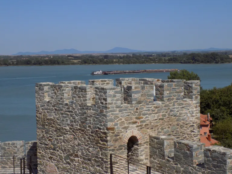 The stone walls of Ram Fortress with the wide Danube behind