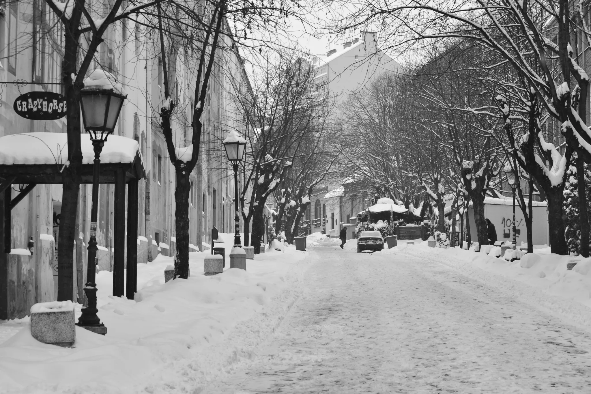 Snow on the cobbles and lamps of Skadarlija in Belgrade