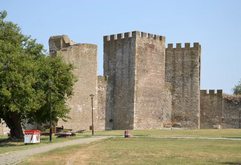 The great towers of Smederevo Fortress behind green lawns