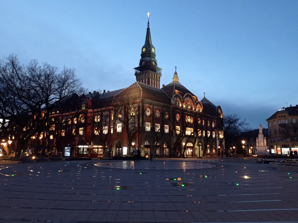 The red-brick Art Nouveau City Hall of Subotica lit up at dusk