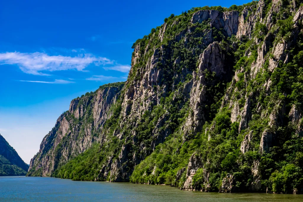 Limestone cliffs of the Đerdap gorge rising above the Danube at the Iron Gates