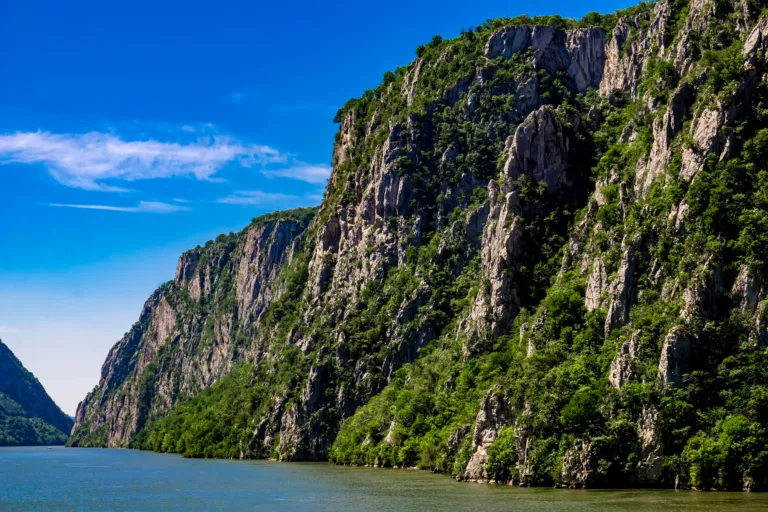 Limestone cliffs of the Đerdap gorge rising above the Danube at the Iron Gates