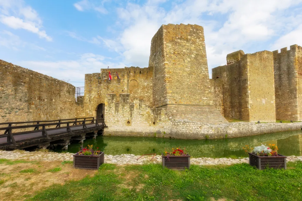 Towers and walls of Smederevo Fortress above the moat bridge