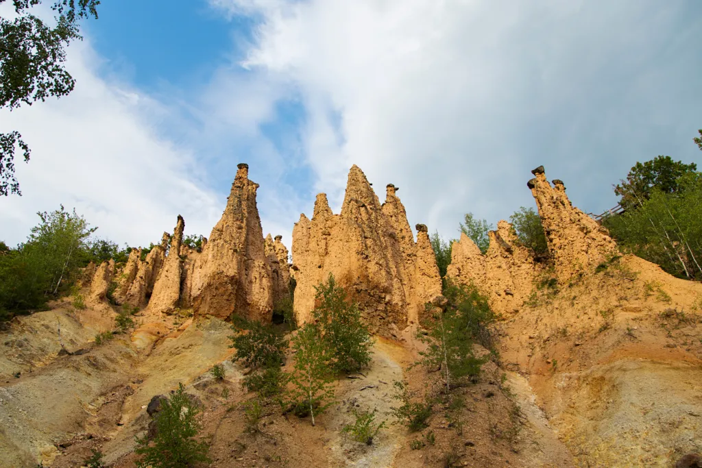 Earth pillars of Đavolja Varoš (Devil’s Town) rising from the eroded hillside