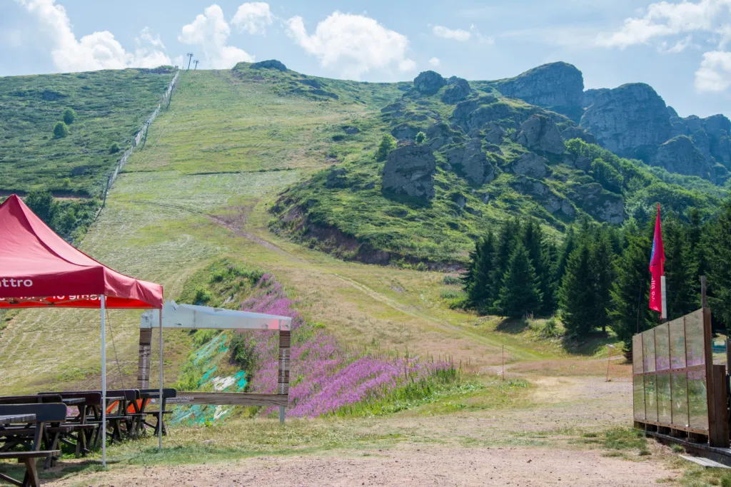 The Babin Zub rock peak above a mountain trail on Stara Planina