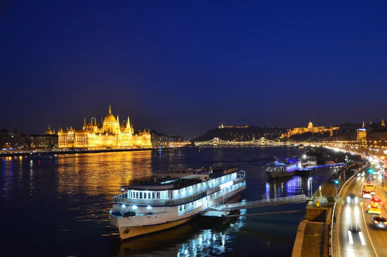 The lit-up Hungarian Parliament on the Danube in Budapest at night