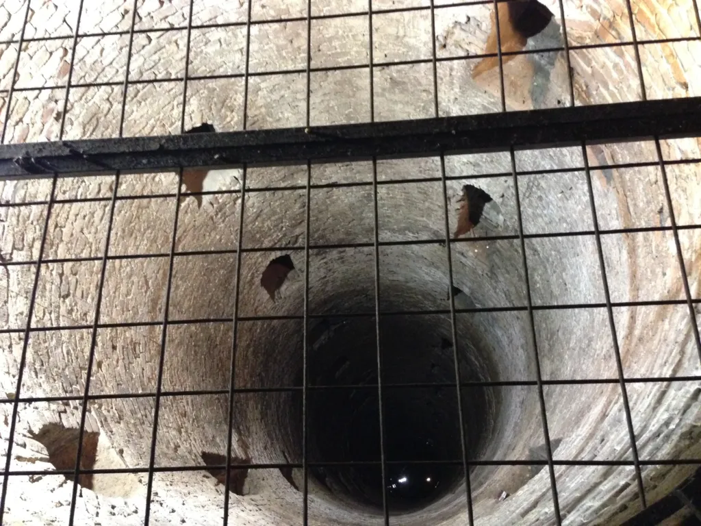 Looking down into the deep shaft of the so-called Roman Well inside Belgrade Fortress